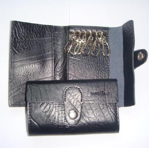 生产销售皮具产品:名片包,钥匙包,钱包,西装夹,护照包,文件夹,皮带